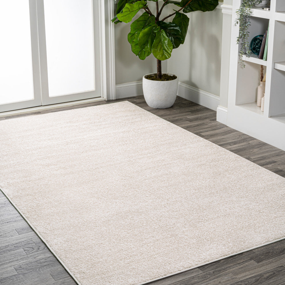 Haze Solid Low-Pile Ivory 12 ft. x 15 ft. Area Rug