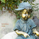 Boy and Girl Reading Statue