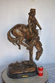 Outlaw by Remington Bronze Statue Replica - Size: 18"L x 10"W x 32"H.