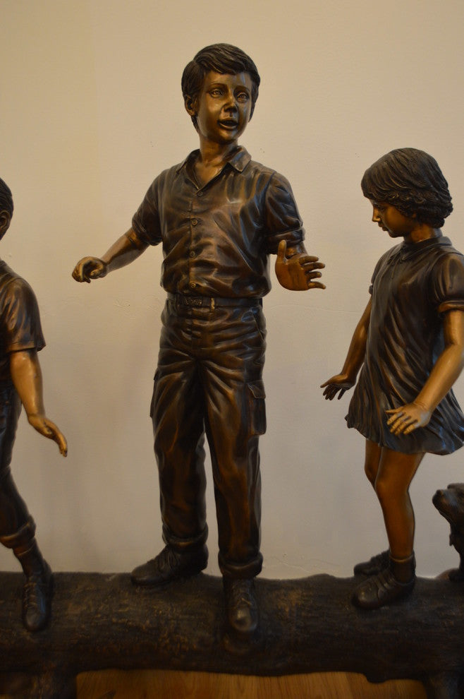 Three Kids With A Dog On A Log Bronze Statue