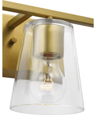 Vertex Collection Three-Light Brushed Gold Clear Glass Contemporary Bath Light