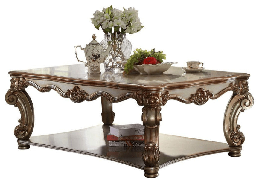 58" Gold Solid And Manufactured Wood Coffee Table With Shelf