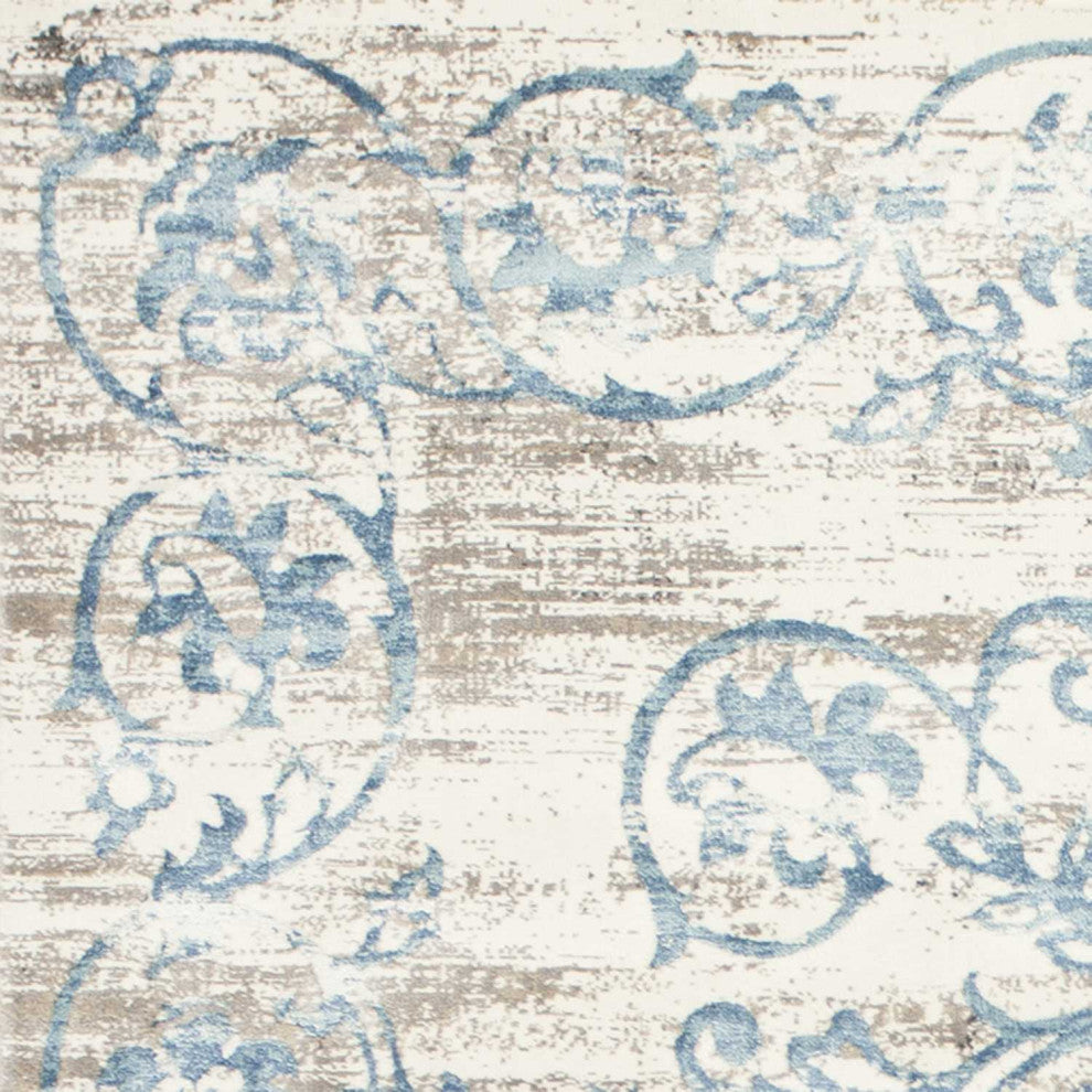 HomeRoots 7' x 11' Polypropylene Ivory or Blue Area Rug