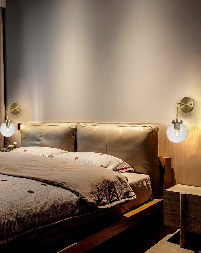 Brass Frame With Black Cord and Clear Glass Globe Shade Wall Sconce