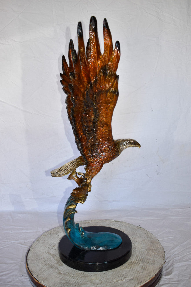 Eagle In Action Catching a Fish from Water Bronze Statue Size: 18" x 17" x 37"