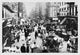 People, Peddlers, and Horse-Drawn Carriages on a Lower East Side Street