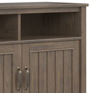 Close-up of the cabinet’s base/leg area.