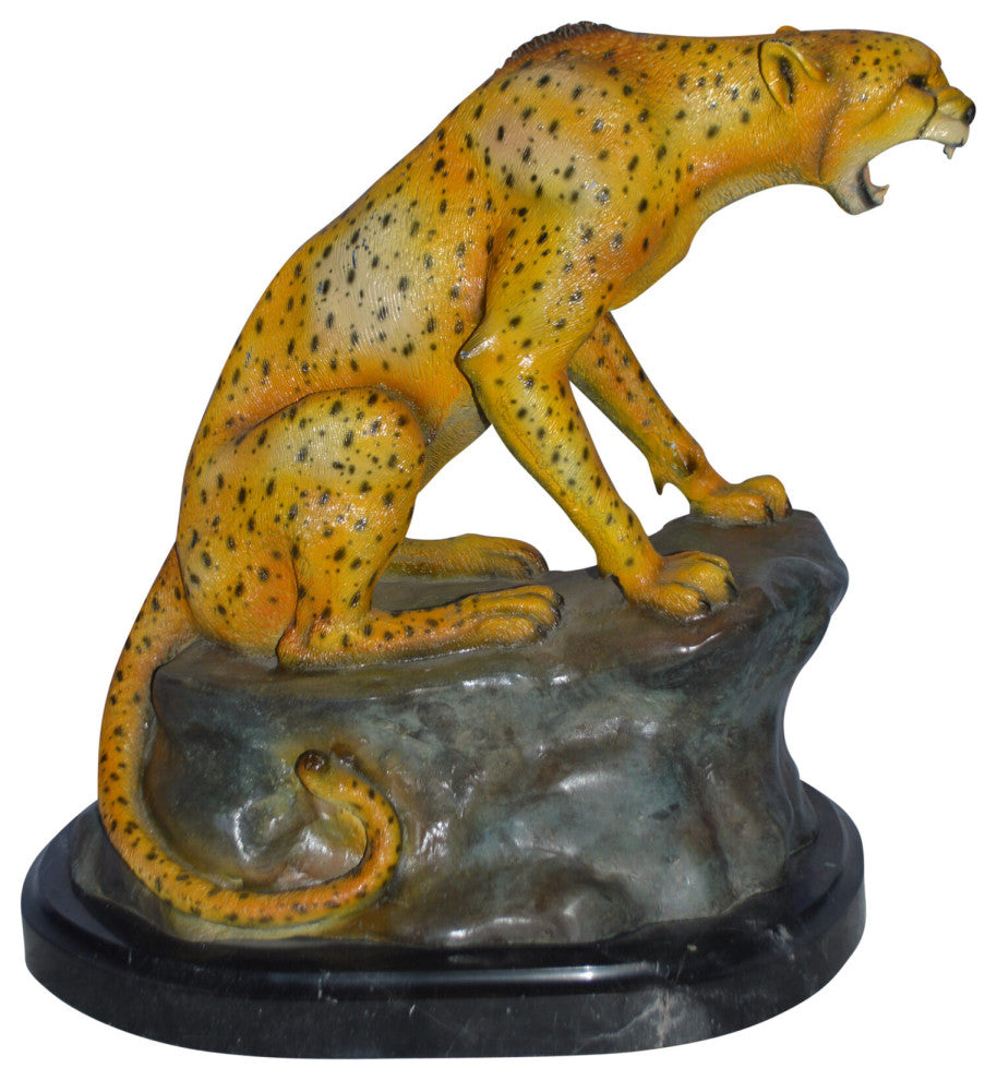 Cheetah sitting on a rock growling bronze statue - Size: 18"L x 12"W x 18"H.