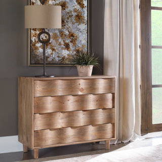Lifestyle image showing the dresser in a real room setting with decor; full product visible.