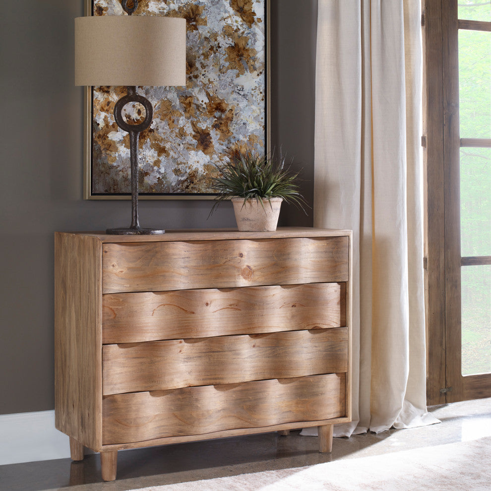 Lifestyle image showing the dresser in a real room setting with decor; full product visible.