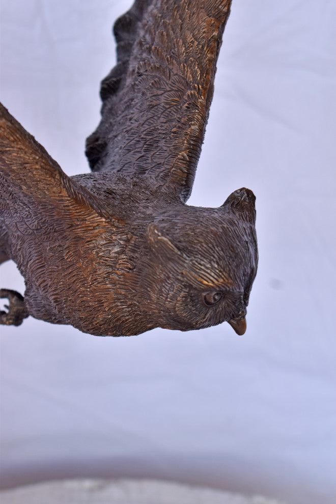 Owl Searching for Prey Bronze Statue Size: 18"L x 11"W x 22"H.