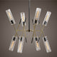 Uttermost Telesto 8 Light 32" Linear Light, Textured Black- Antique Brass