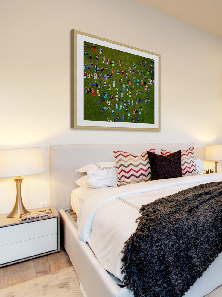 "People On Towels" Framed Print by Karolis Janulis