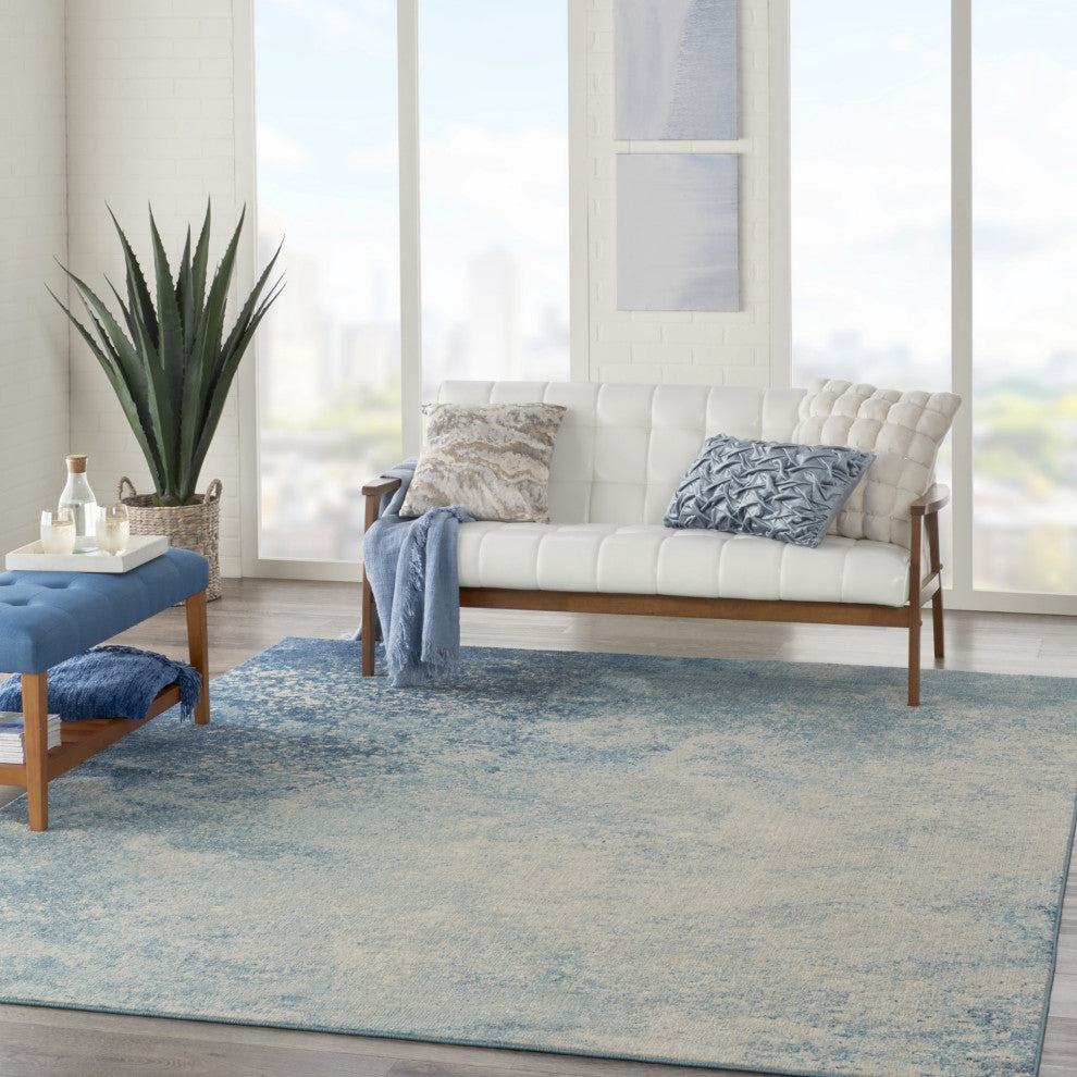 8' X 10' Ivory And Blue Abstract Power Loom Area Rug