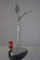 Monkey Resting on a Tree Silver Finish Bronze Statue - Size: 12" x 13" x 27"H.