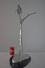 Monkey Resting on a Tree Silver Finish Bronze Statue - Size: 12" x 13" x 27"H.