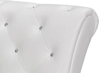 Close-up of tufted button detail on white background (alternate_white_close).