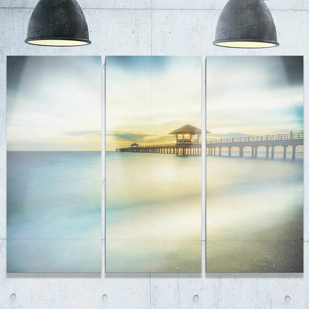 "Blue Tinged Seashore With Distant Pier" Metal Wall Art, 3 Panels, 36"x28"