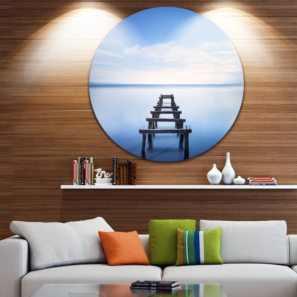 Jetty Remains In Blue Lake, Seascape Photo Round Metal Wall Art, 36"