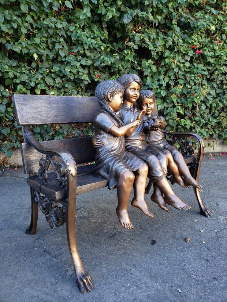 Three kids on a Bench Holding a Bird Bronze Statue -  Size: 40"L x 30"W x 33"H