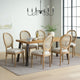 Karlene Farmhouse Fabric Upholstered Wood and Rattan 7 Piece Dining Set
