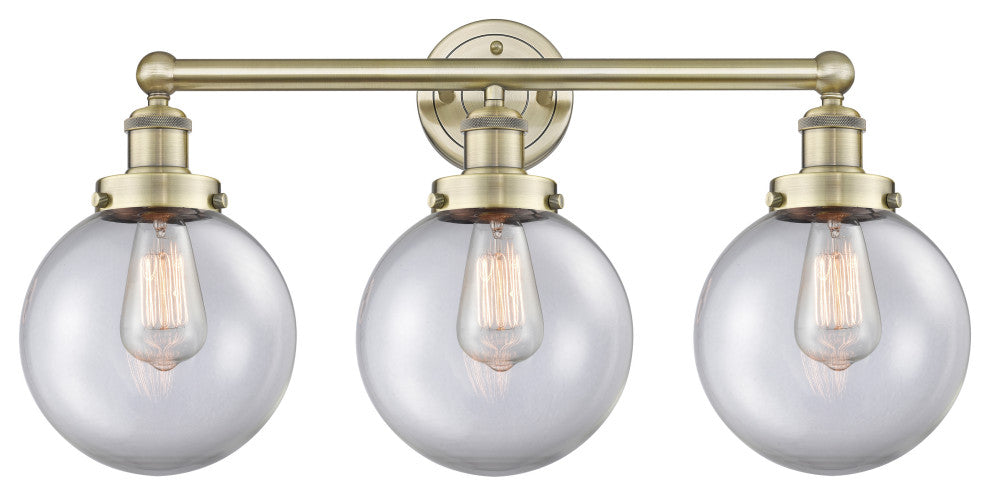 Edison Large Beacon 3-Light 25" Vanity Light, Antique Brass Finish, Clear Shade