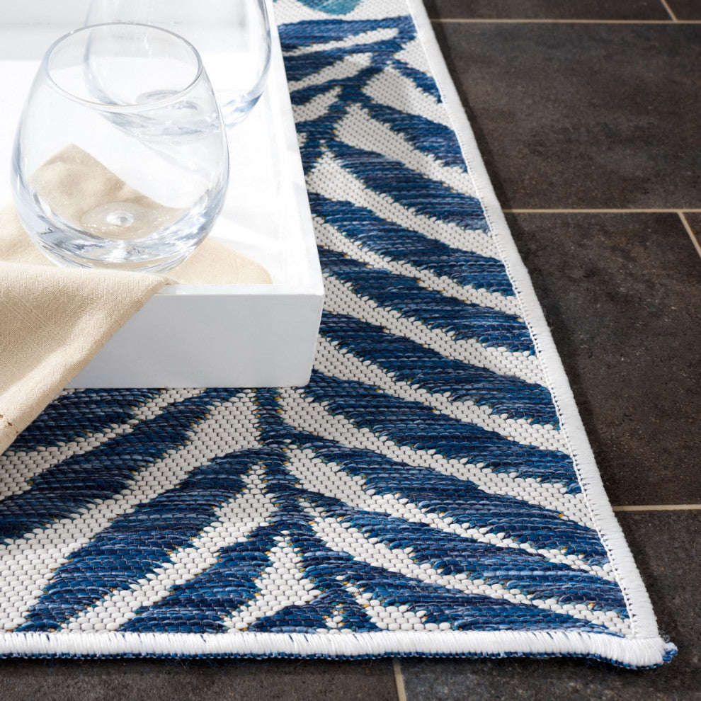Safavieh Sunrise Collection SUN675 Indoor-Outdoor Rug, Ivory/Blue Gold, 4'x5'7"