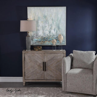 Shown in a real room environment with a dark wall and decor; full cabinet visible.