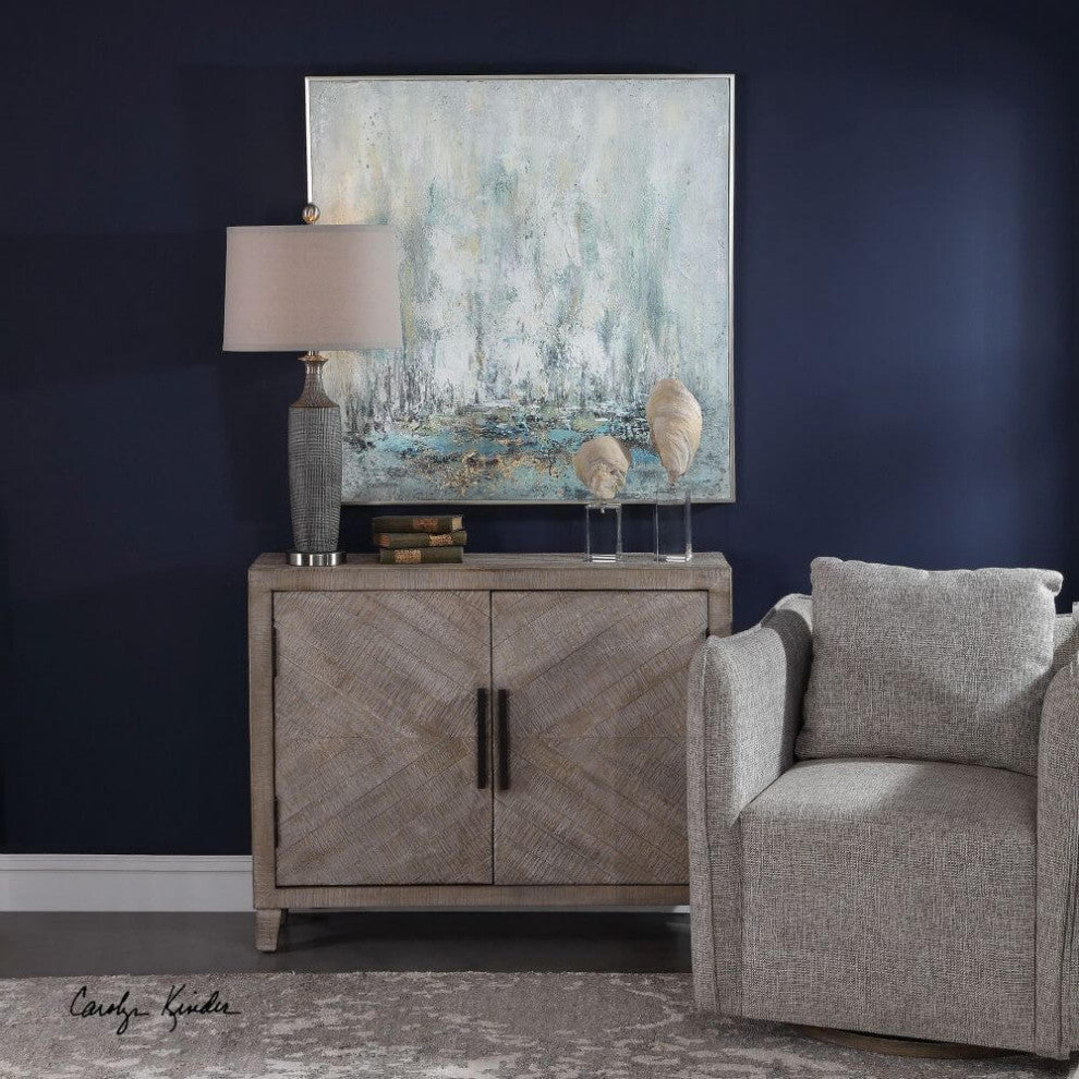 Shown in a real room environment with a dark wall and decor; full cabinet visible.