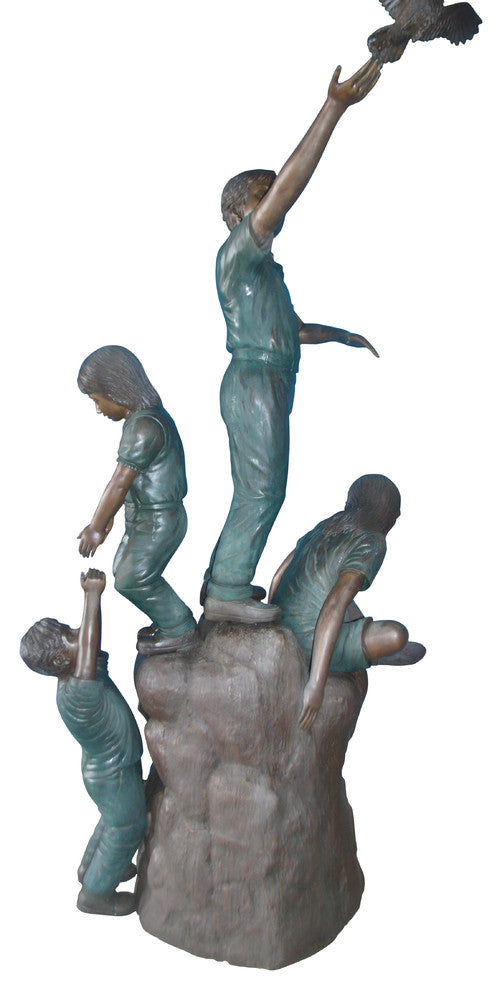 Four Kids Playing on a Rock Bronze Statue -  Size: 49"L x 26"W x 89"H.