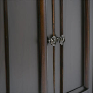 Close-up of a cabinet door handle; neutral background (not white close-up).