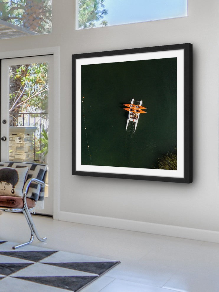 "Orange Kayaks" Framed Print by Karolis Janulis