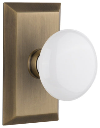 Studio Plate Passage Poreclain Door Knob, Antique Brass