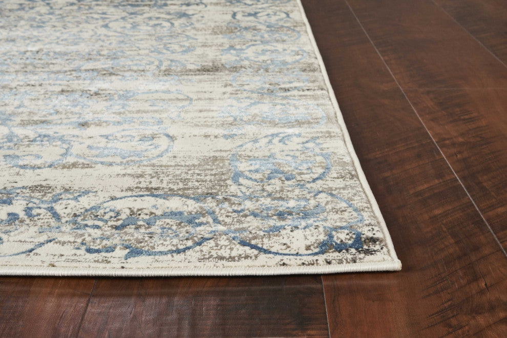 HomeRoots 7' x 11' Polypropylene Ivory or Blue Area Rug