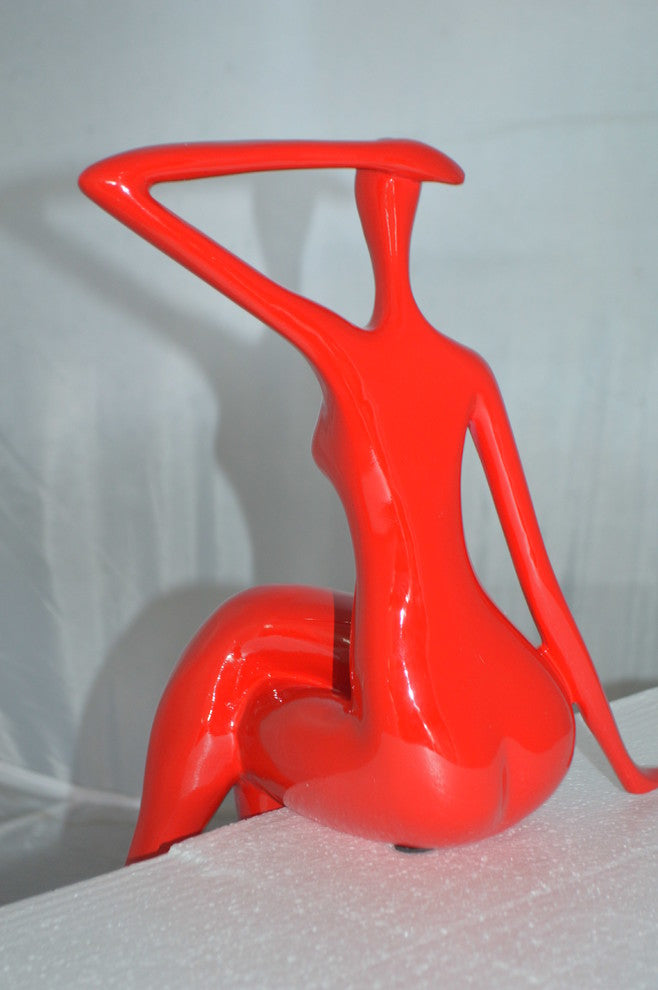 Modern Art Sitting on Edge Girl Made of Resin -  Size: 9"L x 7"W x 16"H.
