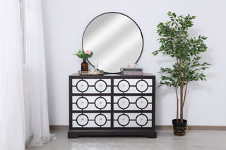 Lifestyle shot showing cabinet in a room setting; decor present; full product visible.