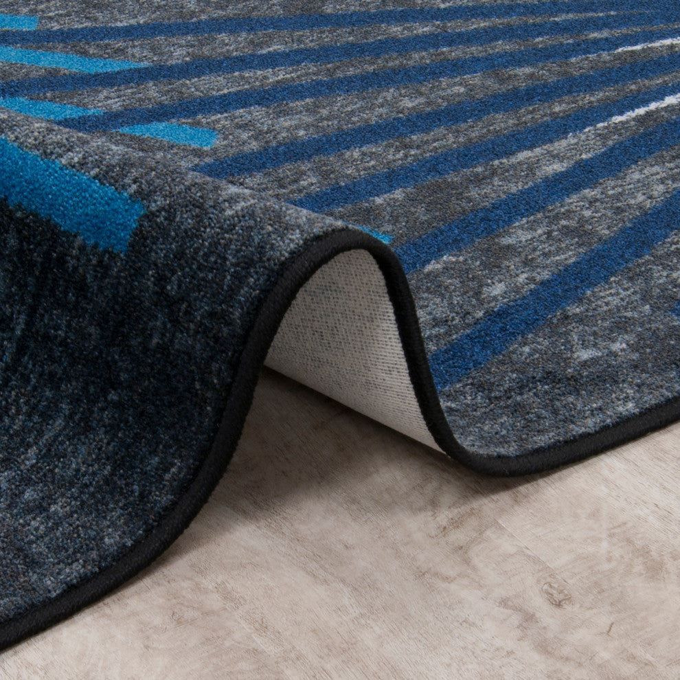 Sputnik 7'8" x 10'9" area rug in color Sapphire