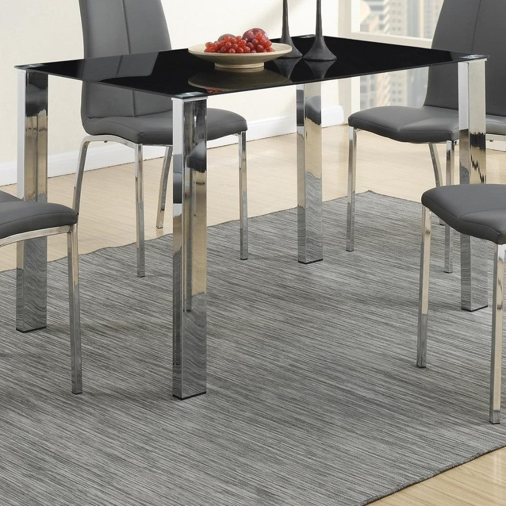 Metal Based Dining Table With Dramatic Black Glass Top