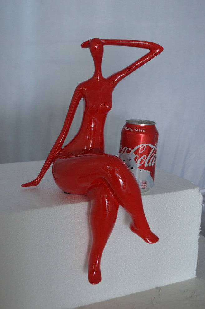 Modern Art Sitting on Edge Girl Made of Resin -  Size: 9"L x 7"W x 16"H.