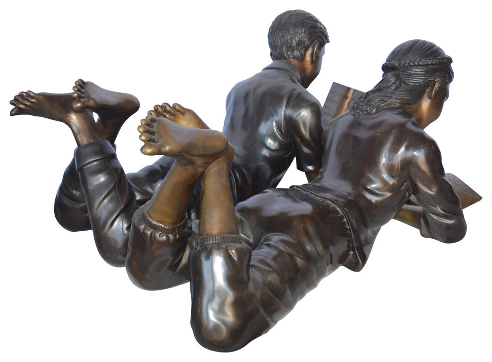 A Set of Boy and Girl Reading Books Bronze Statue -  Size: 31"L x 10"W x 14"H.