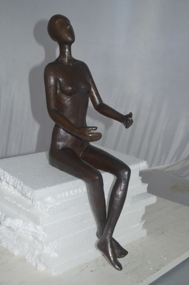Abstract of Nude Girl sitting Bronze Statue -  Size: 9"L x 6"W x 21"H.