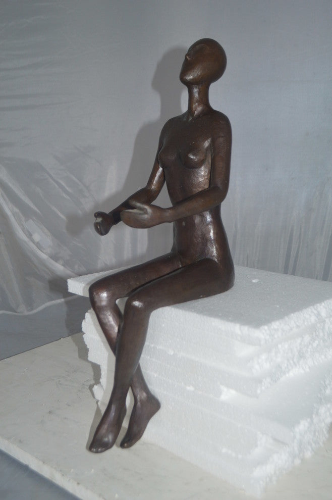 Abstract of Nude Girl sitting Bronze Statue -  Size: 9"L x 6"W x 21"H.