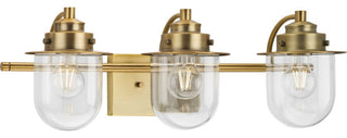 Northlake Collection Three-Light Vintage Brass Clear Glass Bath Light