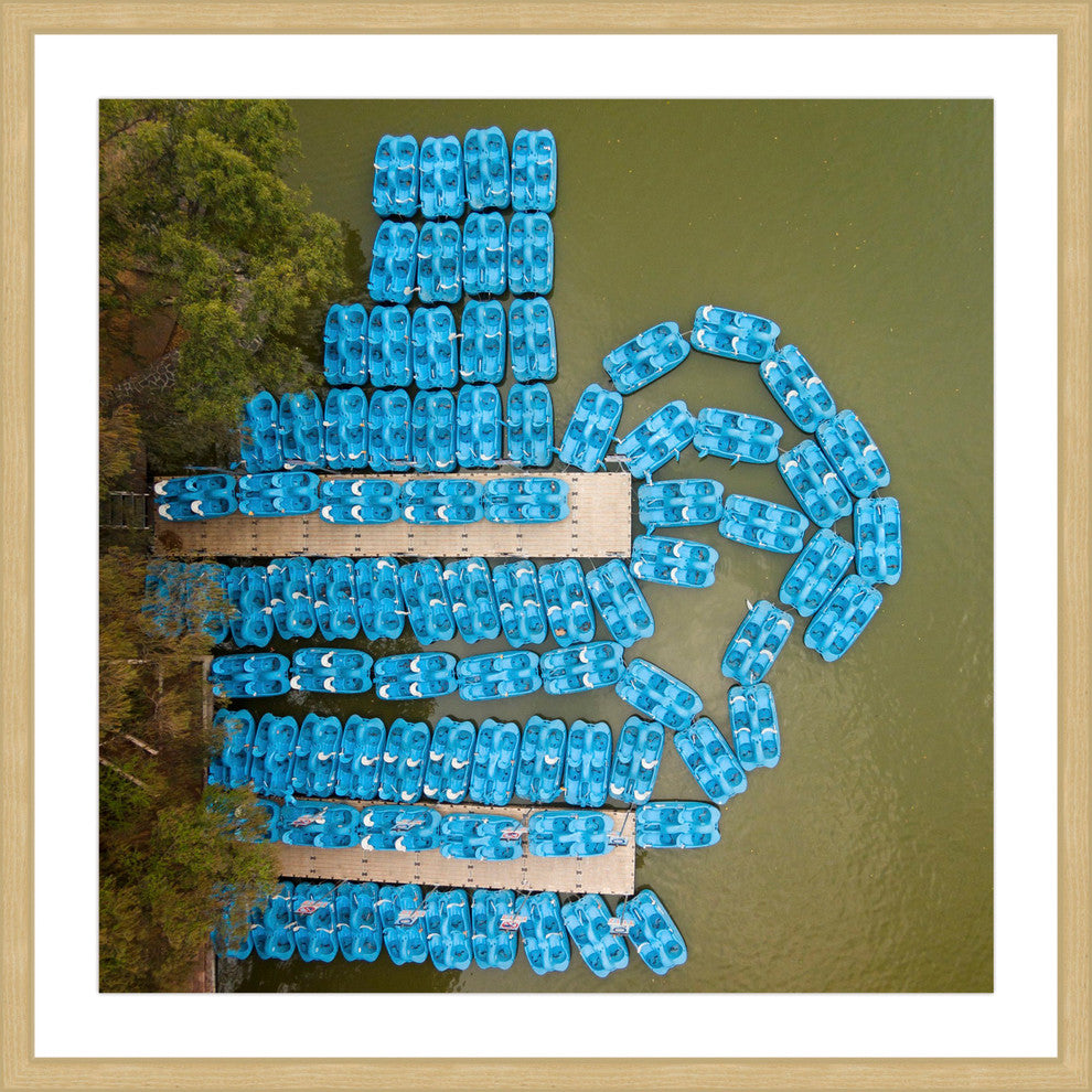 "Blue Paddleboats" Framed Print by Karolis Janulis