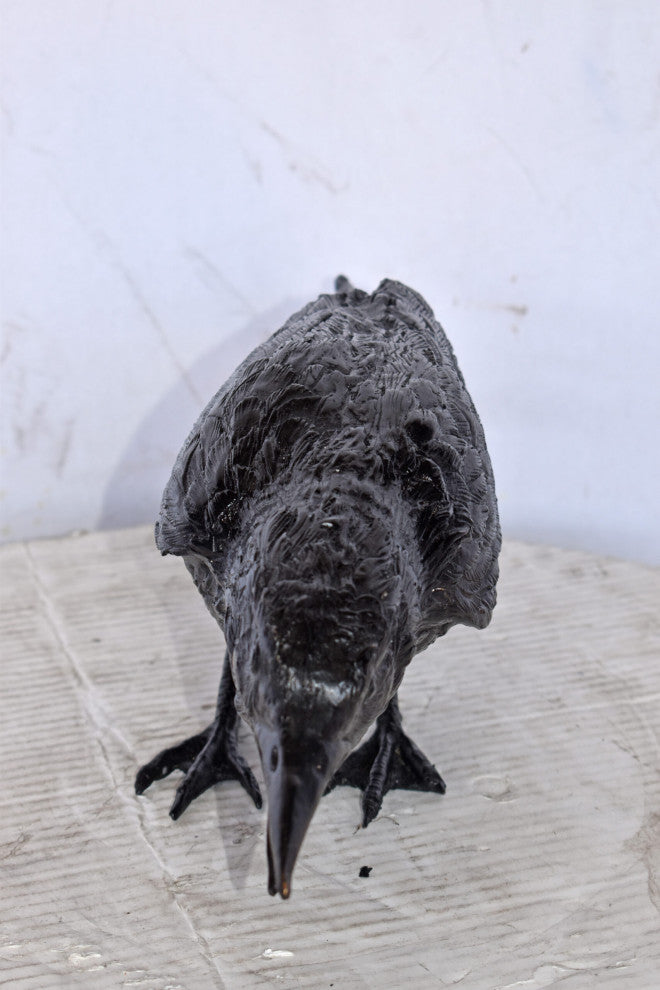 Raven Looking for Food Bronze State - Size: 24"L x 6"W x 12"H.