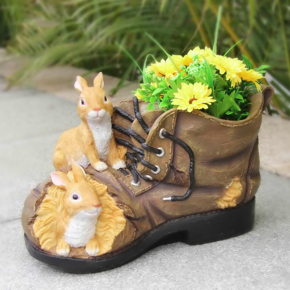 Two Rabbits Nested in Shoe Flower Pot