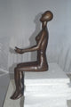 Abstract of Nude Girl sitting Bronze Statue -  Size: 9"L x 6"W x 21"H.