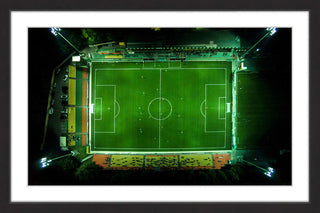 "Soccer From Above" Framed Print by Karolis Janulis