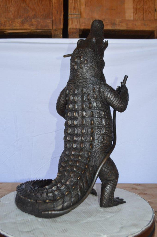 Alligator having fun bronze statue - fountain -  Size: 15"L x 15"W x 31"H.