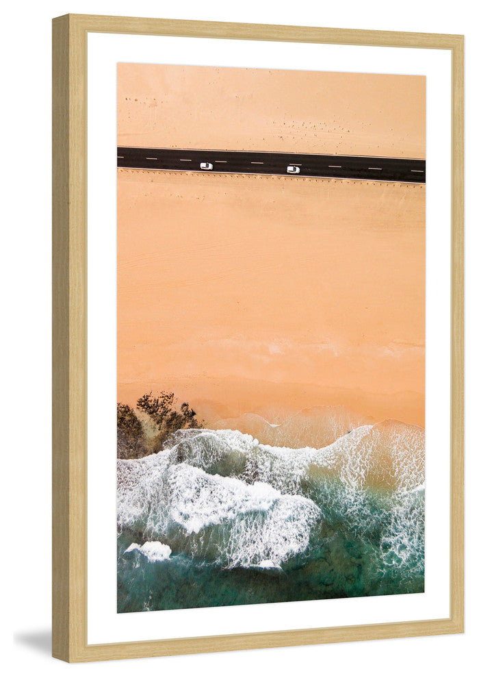 "Driving Along The Beach" Framed Print by Karolis Janulis